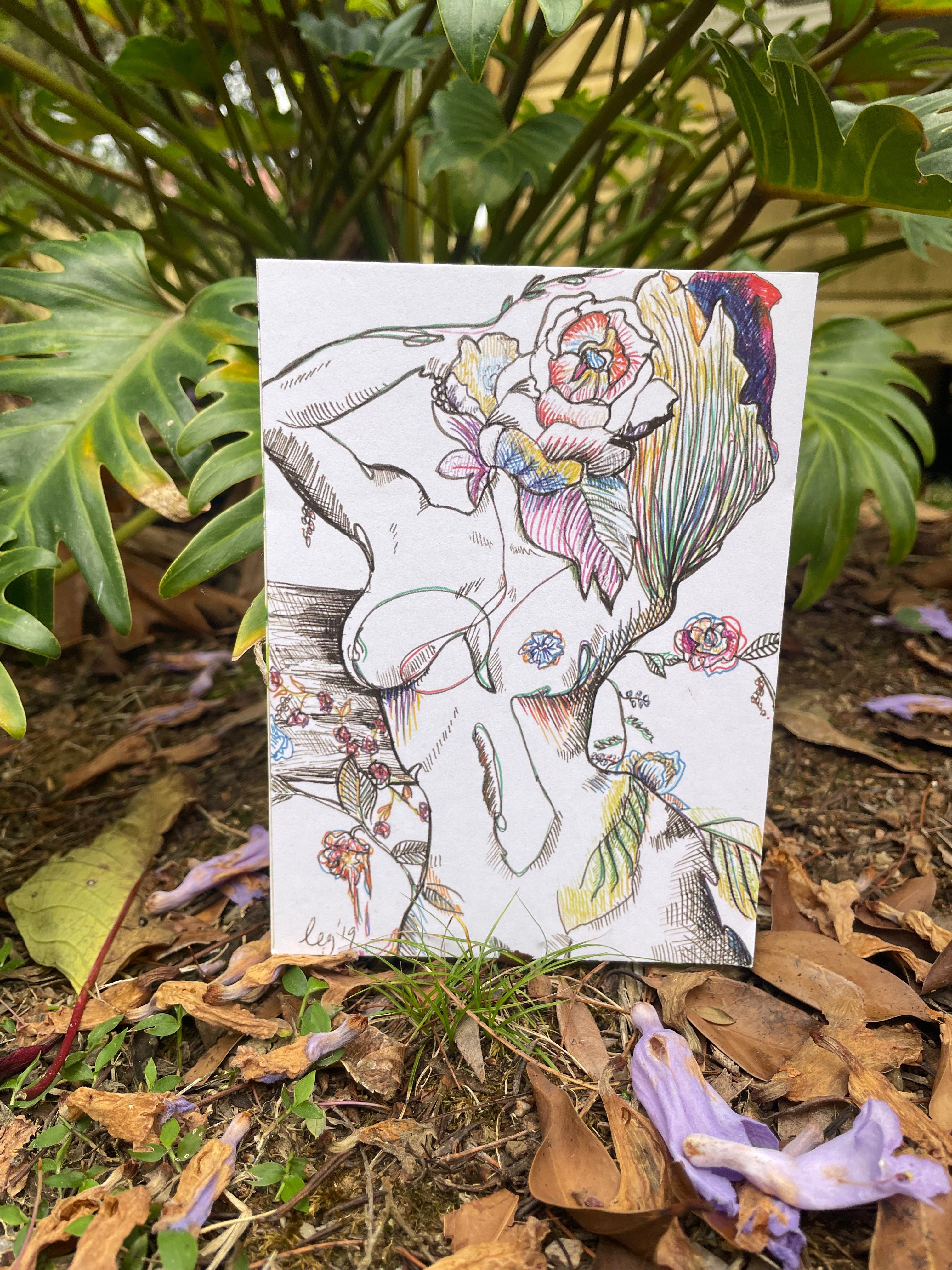 beautiful handmade postcard of a plant covered woman healing her heart