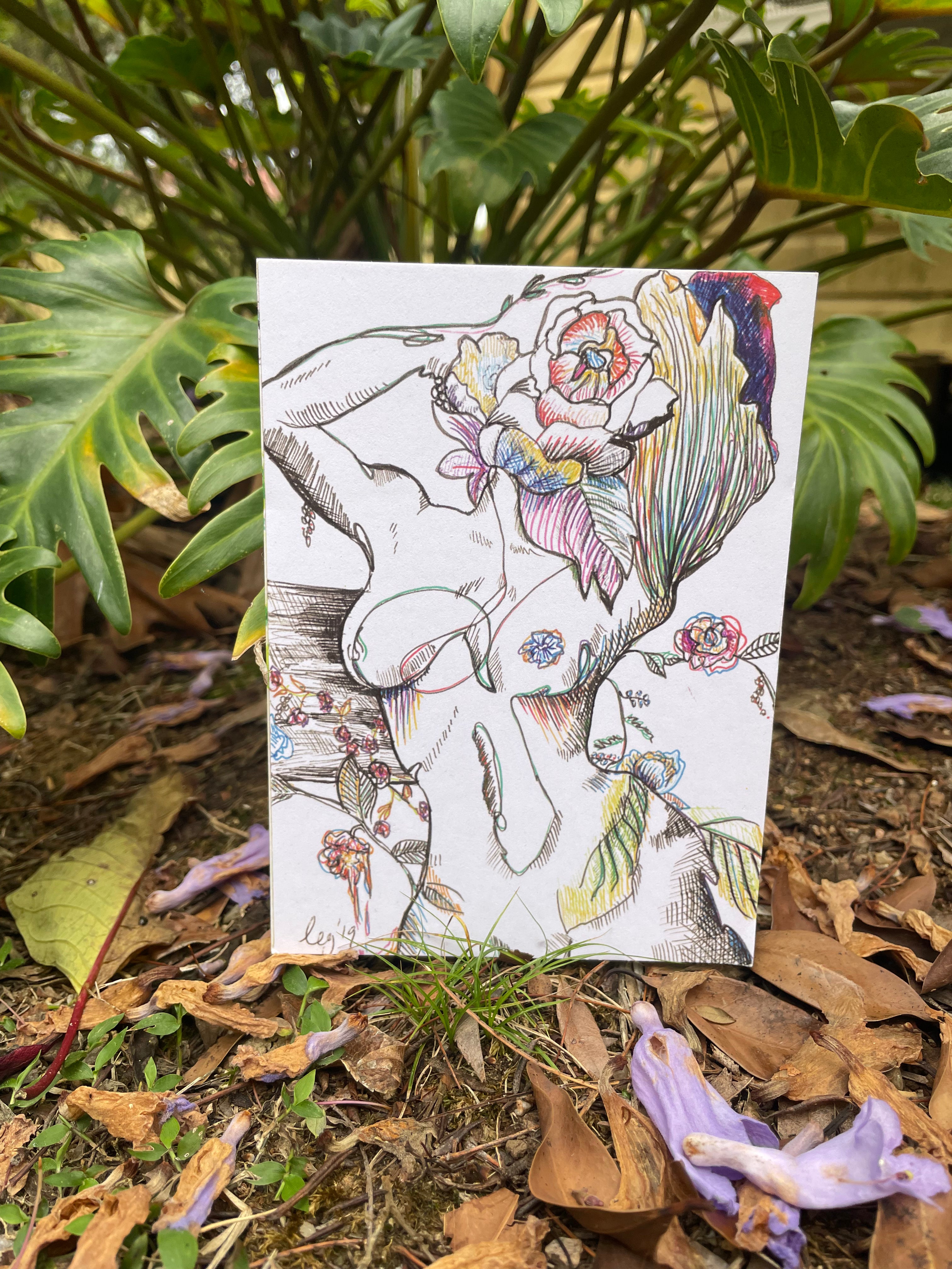 beautiful handmade postcard of a plant covered woman healing her heart